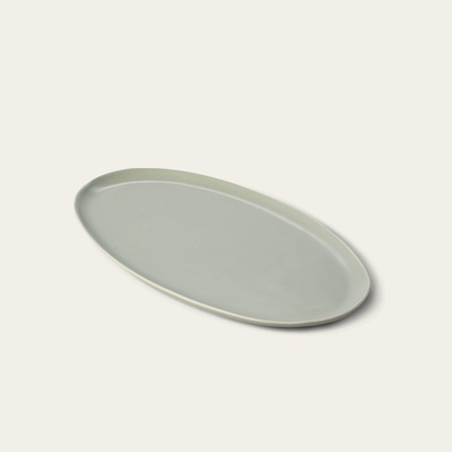 Oval serving platter dinnerware by Fable Home, in a beachgrassgreen color. – #beachgrassgreen