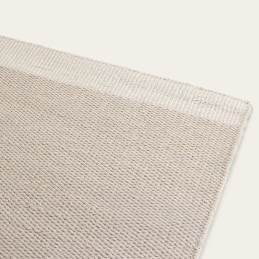 Close-up of a Dune gray wool rug showing the texture and weave. #dunegray