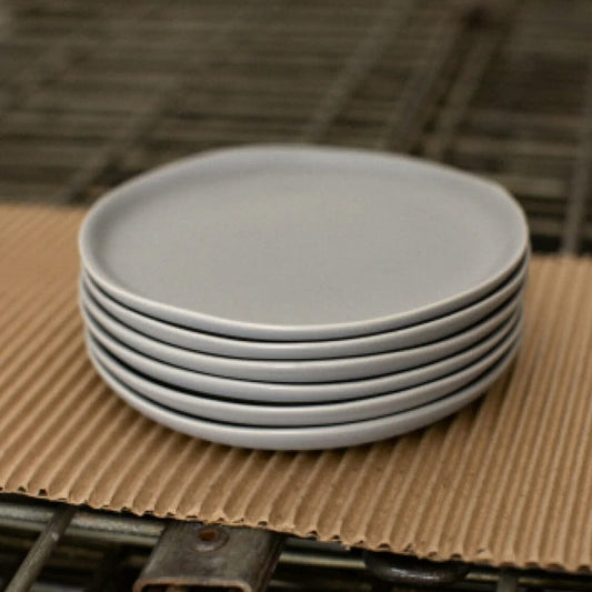 Dessert plates dinnerware by Fable Home, shown in a midnightblue finish. – #midnightblue