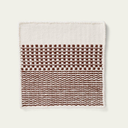 Linear Wool Rug with red and white pattern on a light gray background, #burntsienna