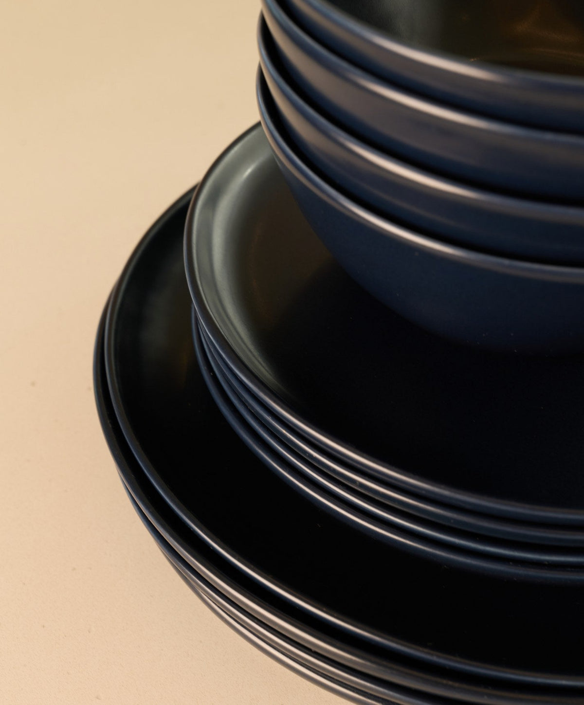 Dinnerware Set by Fable Home, shown in Midnight Blue.