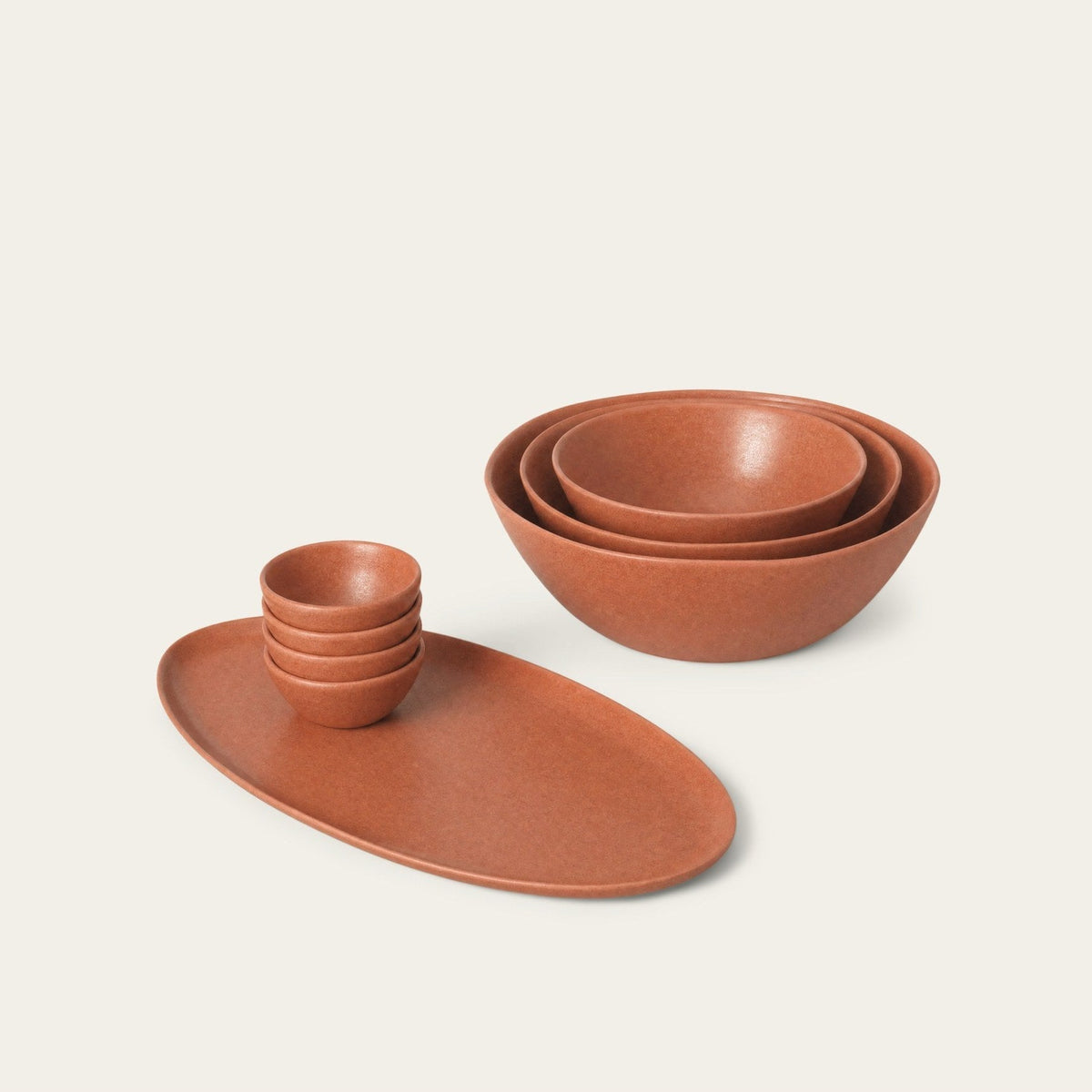 Serving Ceramics Set by Fable Home, shown in Canyon Clay.