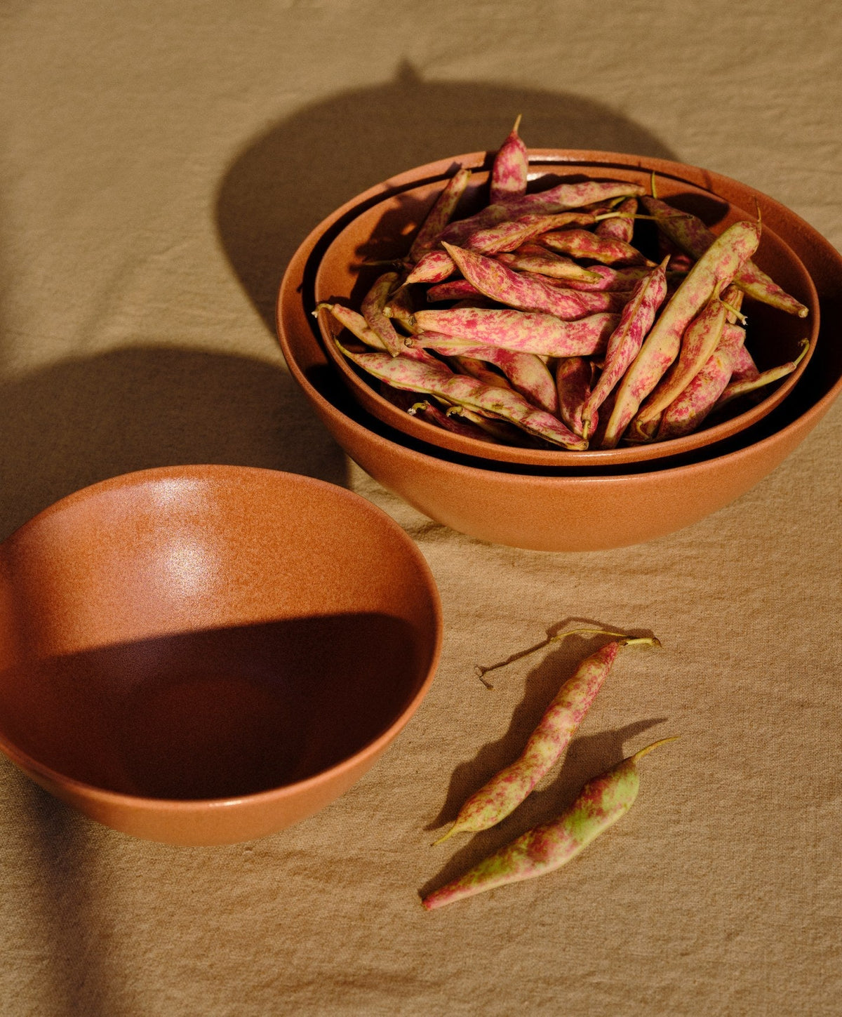 Serving Ceramics Set by Fable Home, shown in Canyon Clay.