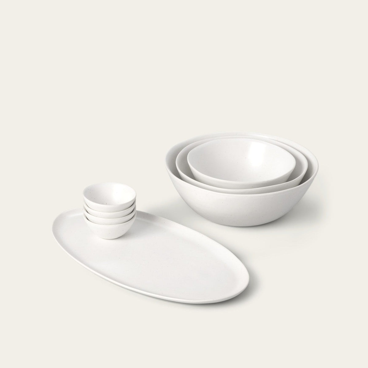 Serving Ceramics Set by Fable Home, shown in Speckled White.
