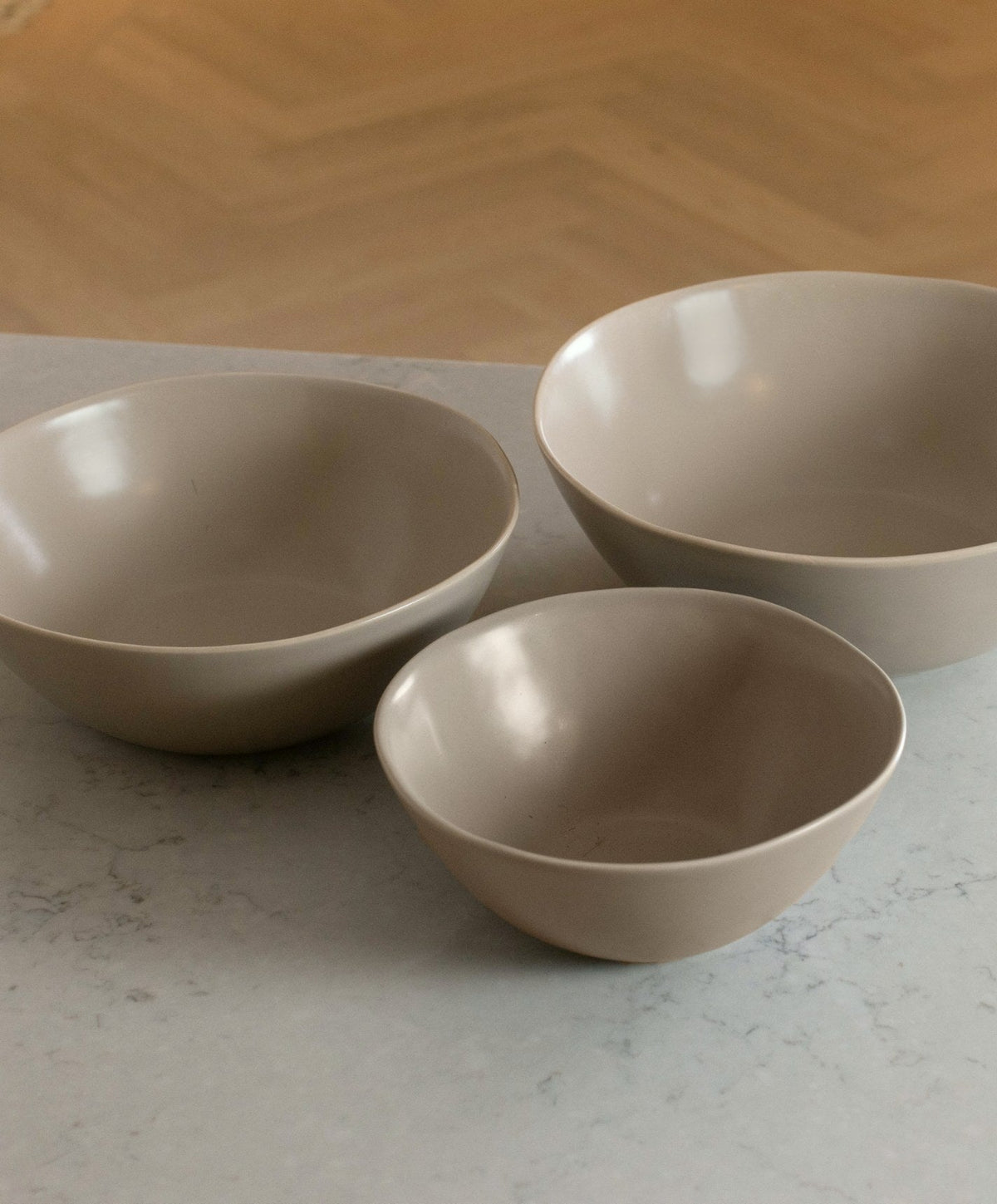 Nested Serving Bowls by Fable Home, shown in Desert Taupe.