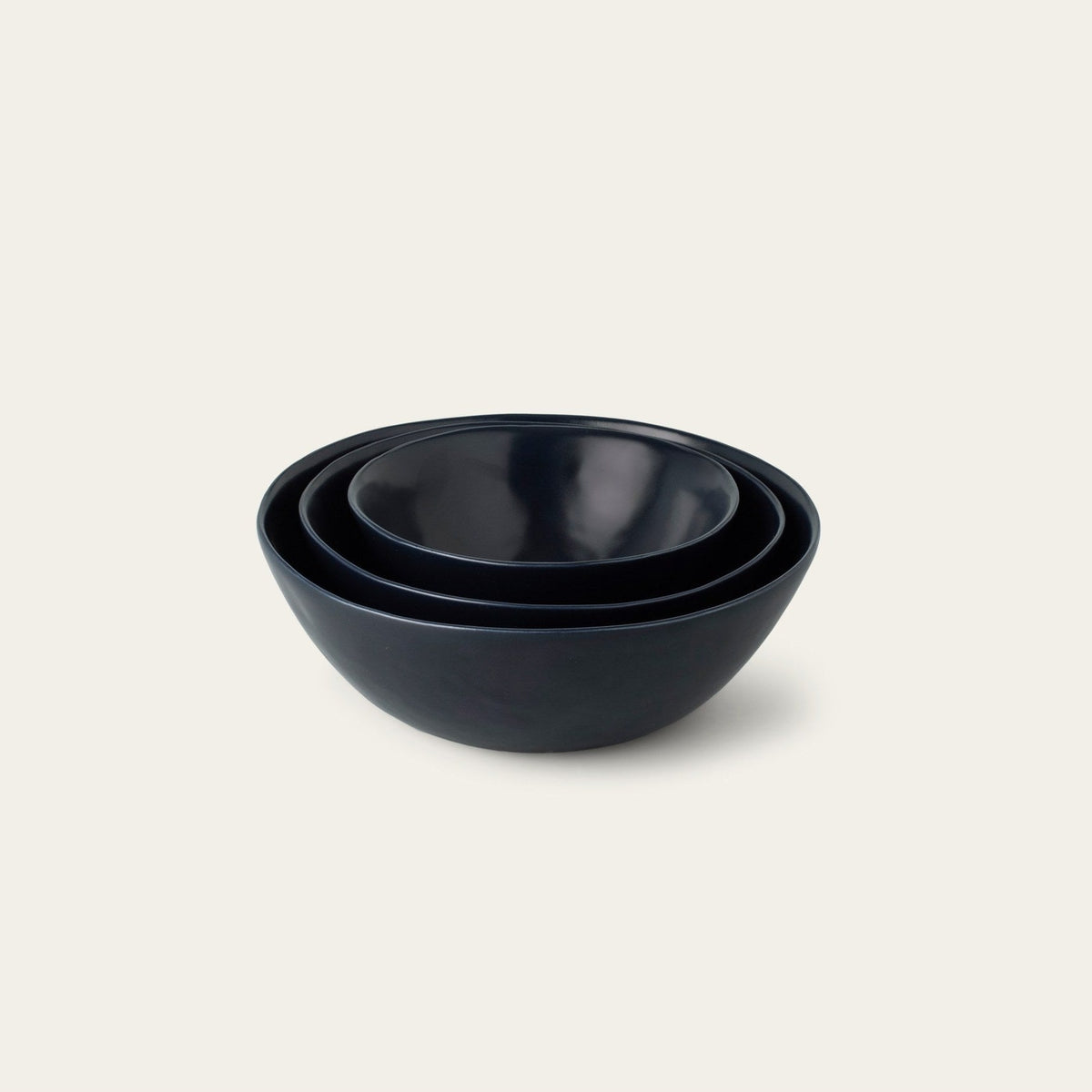Nested Serving Bowls by Fable Home, shown in Midnight Blue.