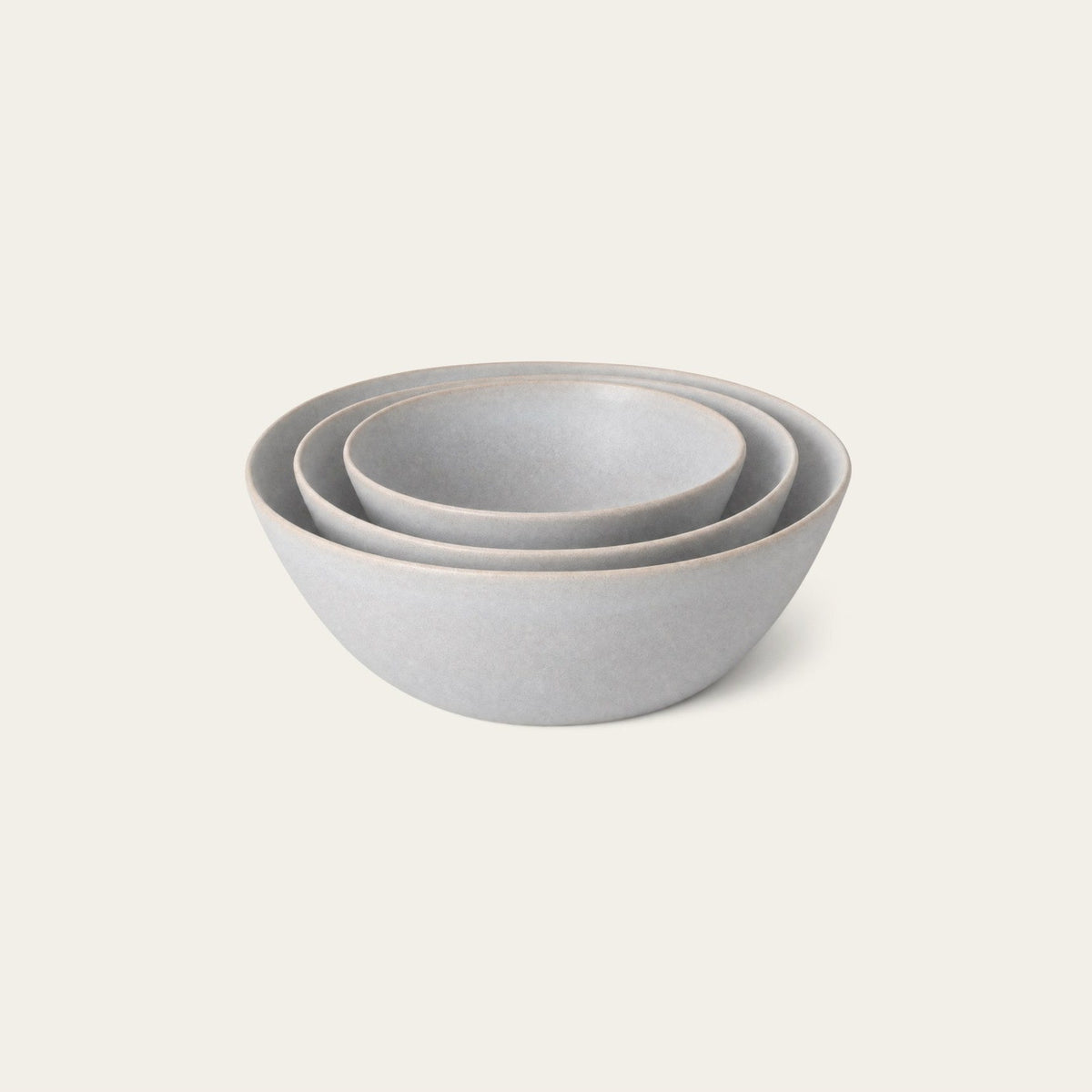 Nested Serving Bowls by Fable Home, shown in Stone Blue.