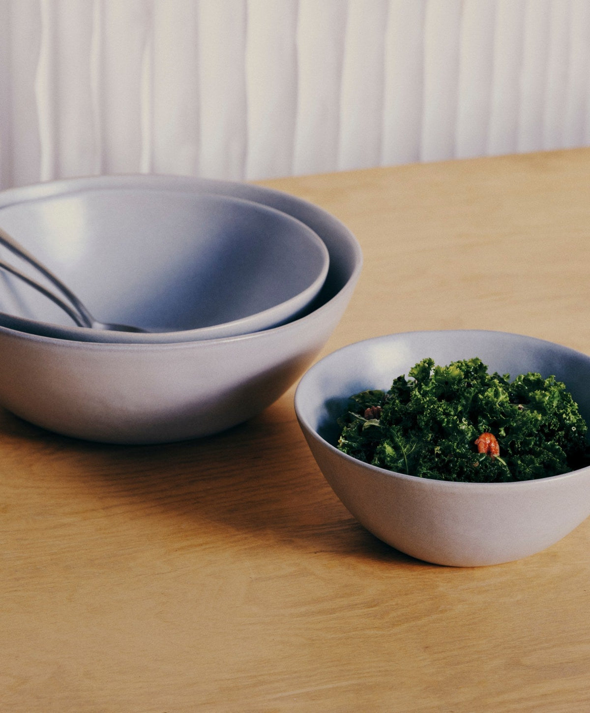Nested Serving Bowls by Fable Home, shown in Stone Blue.