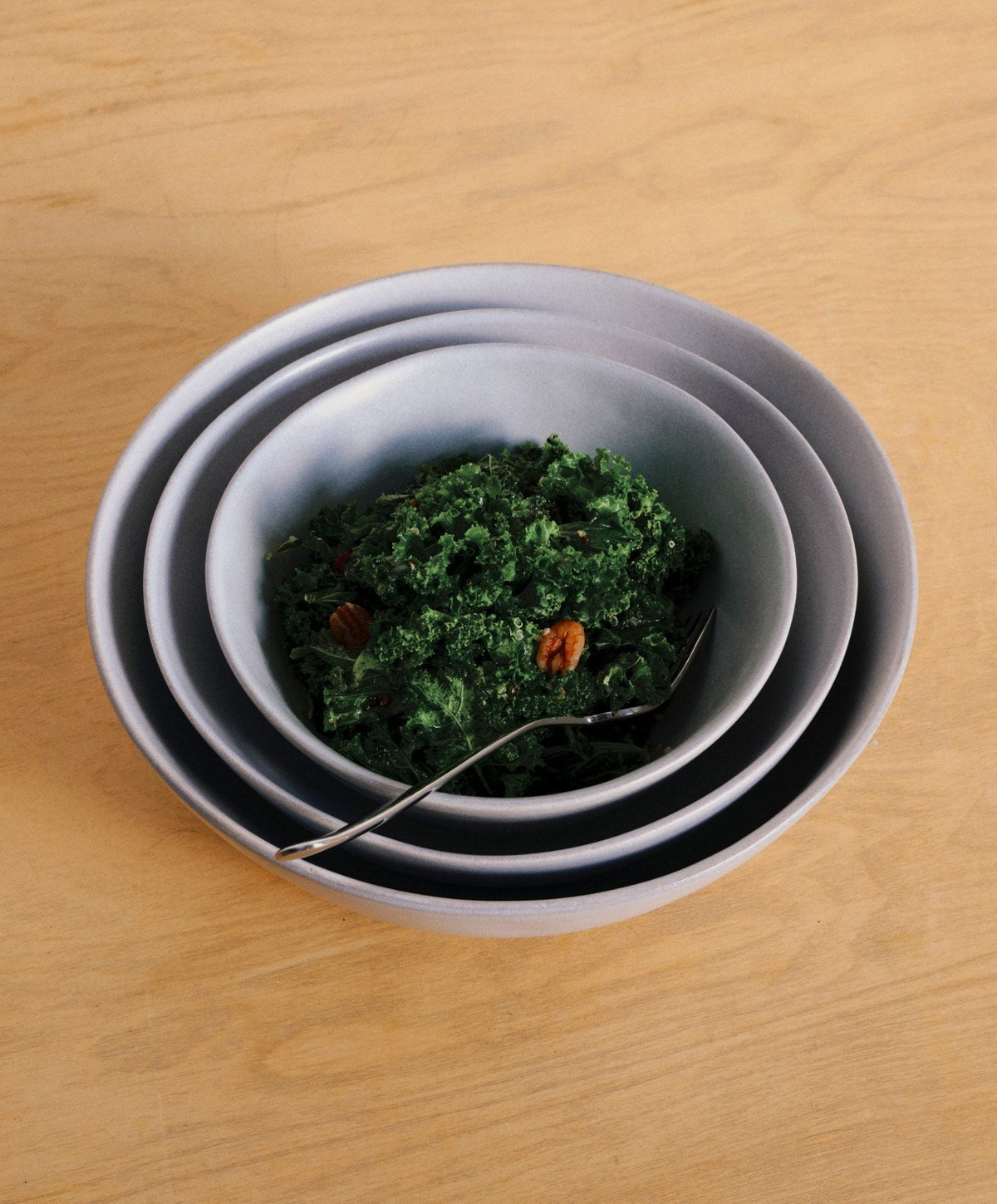 Nested Serving Bowls by Fable Home, shown in Stone Blue.