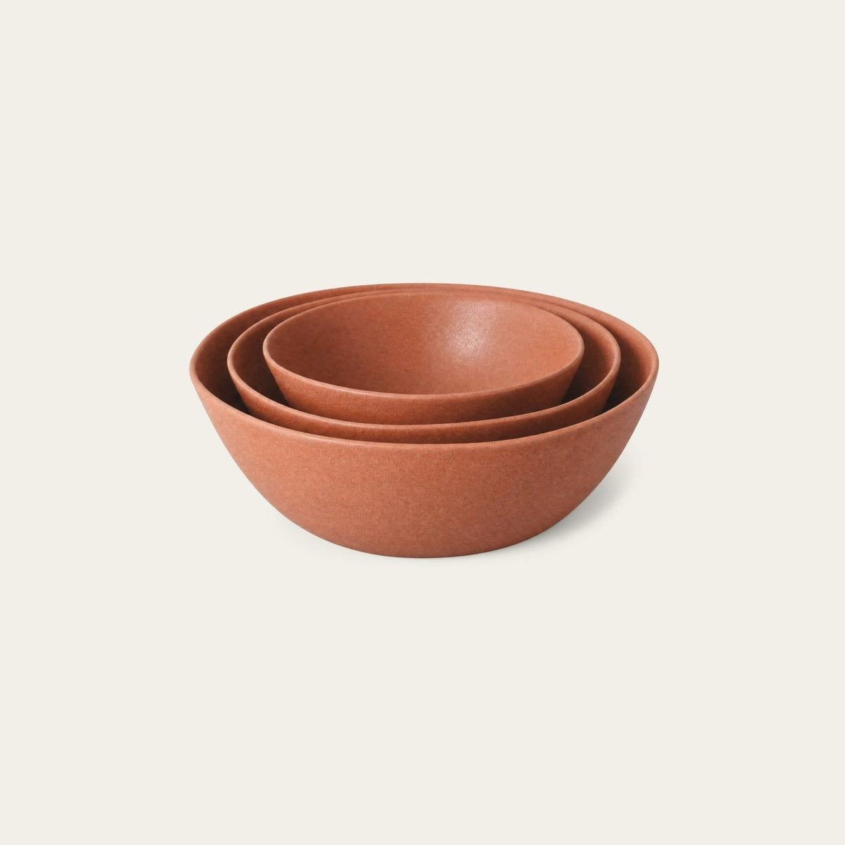 Nested Serving Bowls by Fable Home, shown in Canyon Clay.