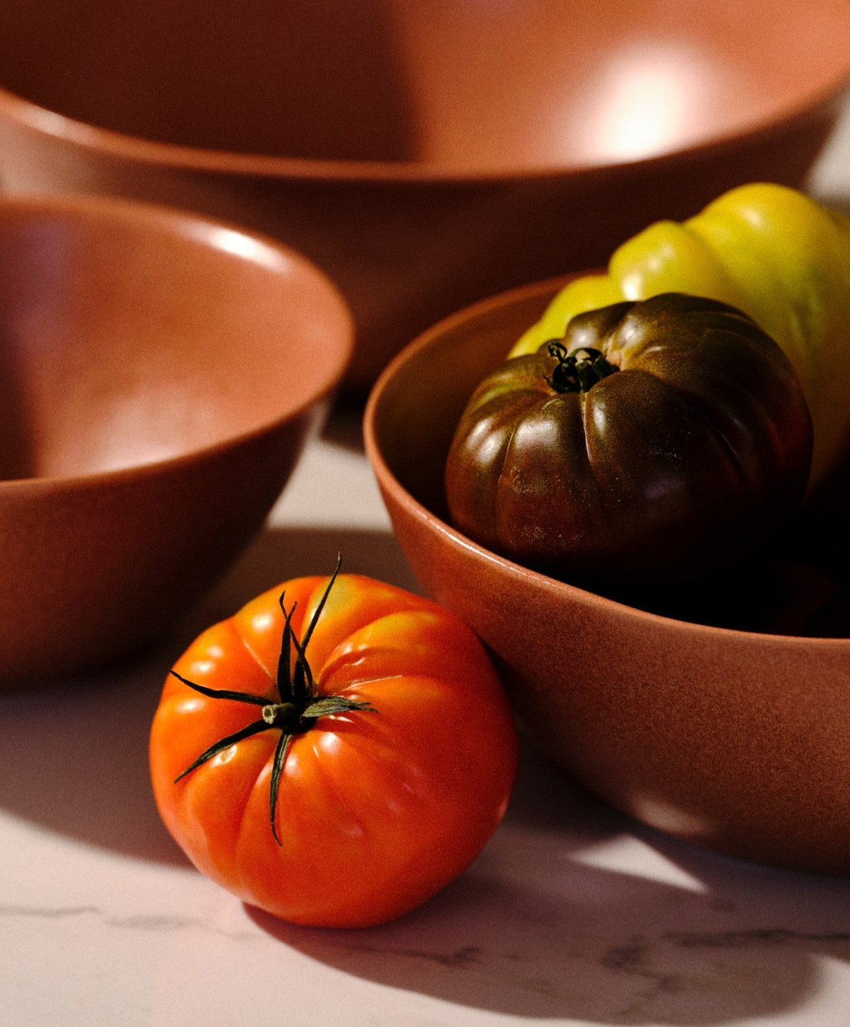 Nested Serving Bowls by Fable Home, shown in Canyon Clay.