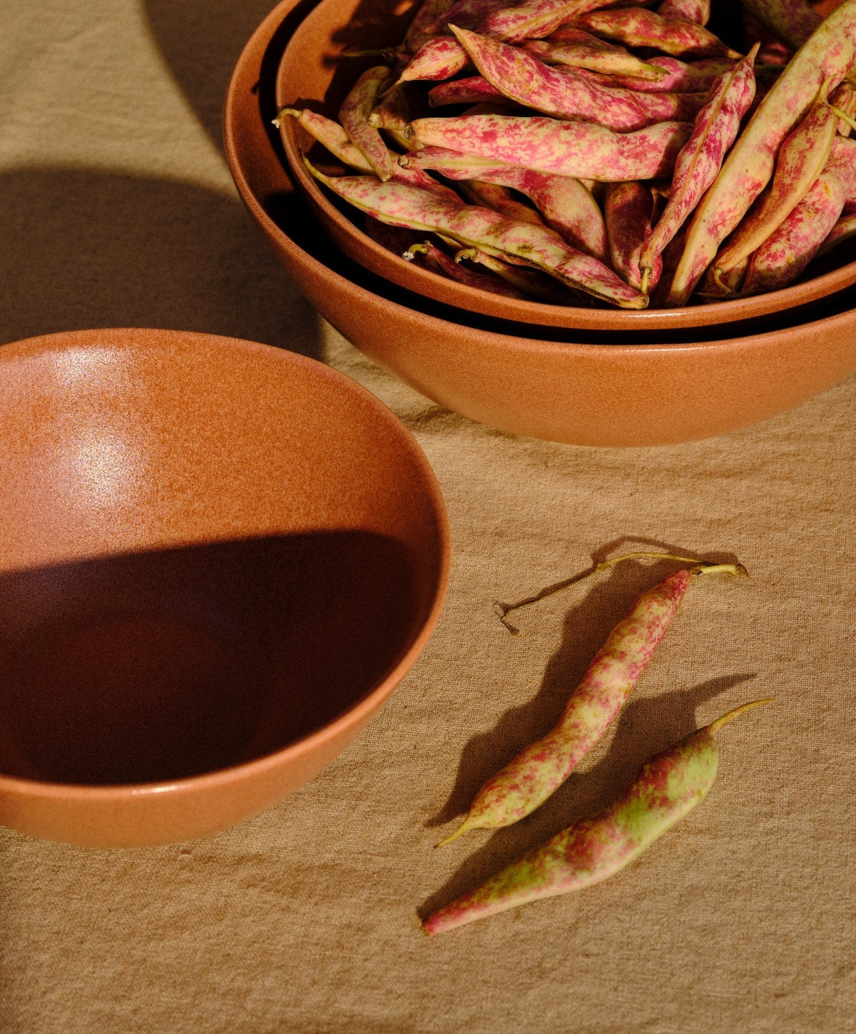 Nested Serving Bowls by Fable Home, shown in Canyon Clay.