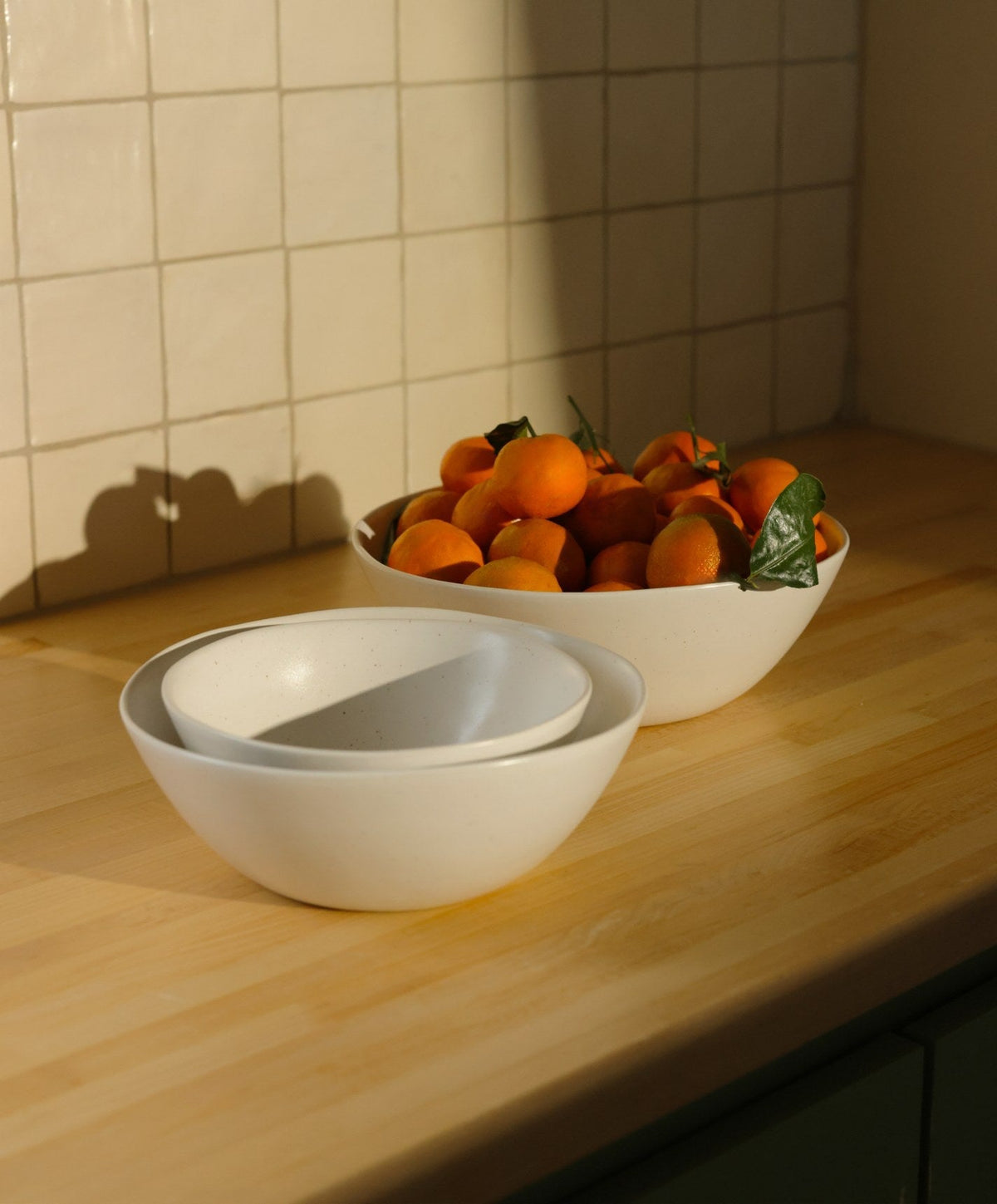 Nested Serving Bowls by Fable Home, shown in Speckled White.