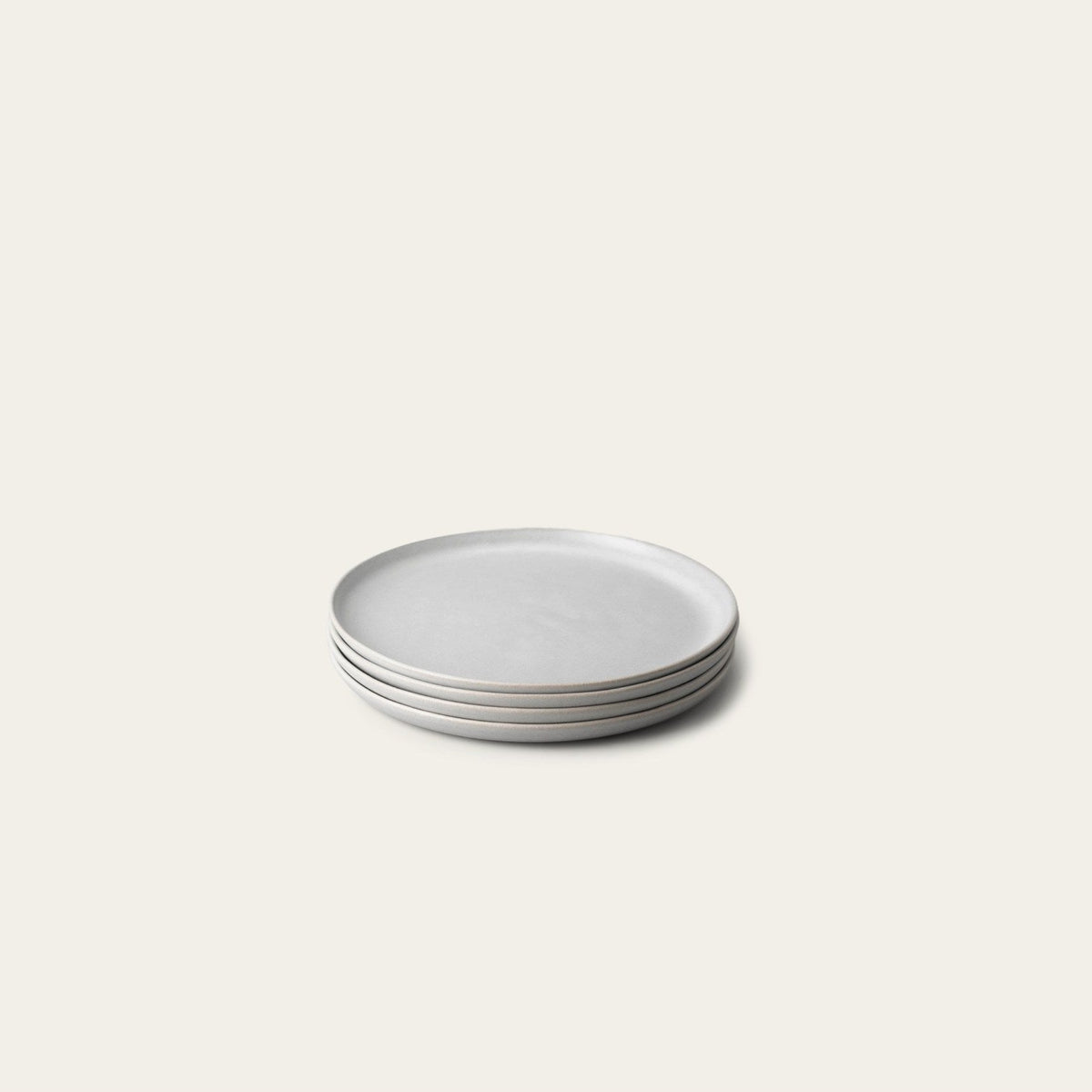 Salad Plates by Fable Home, shown in Stone Blue.