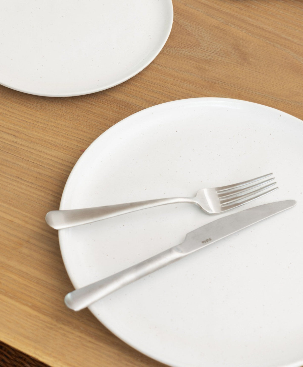 Lunch Plates by Fable Home, shown in Speckled White.