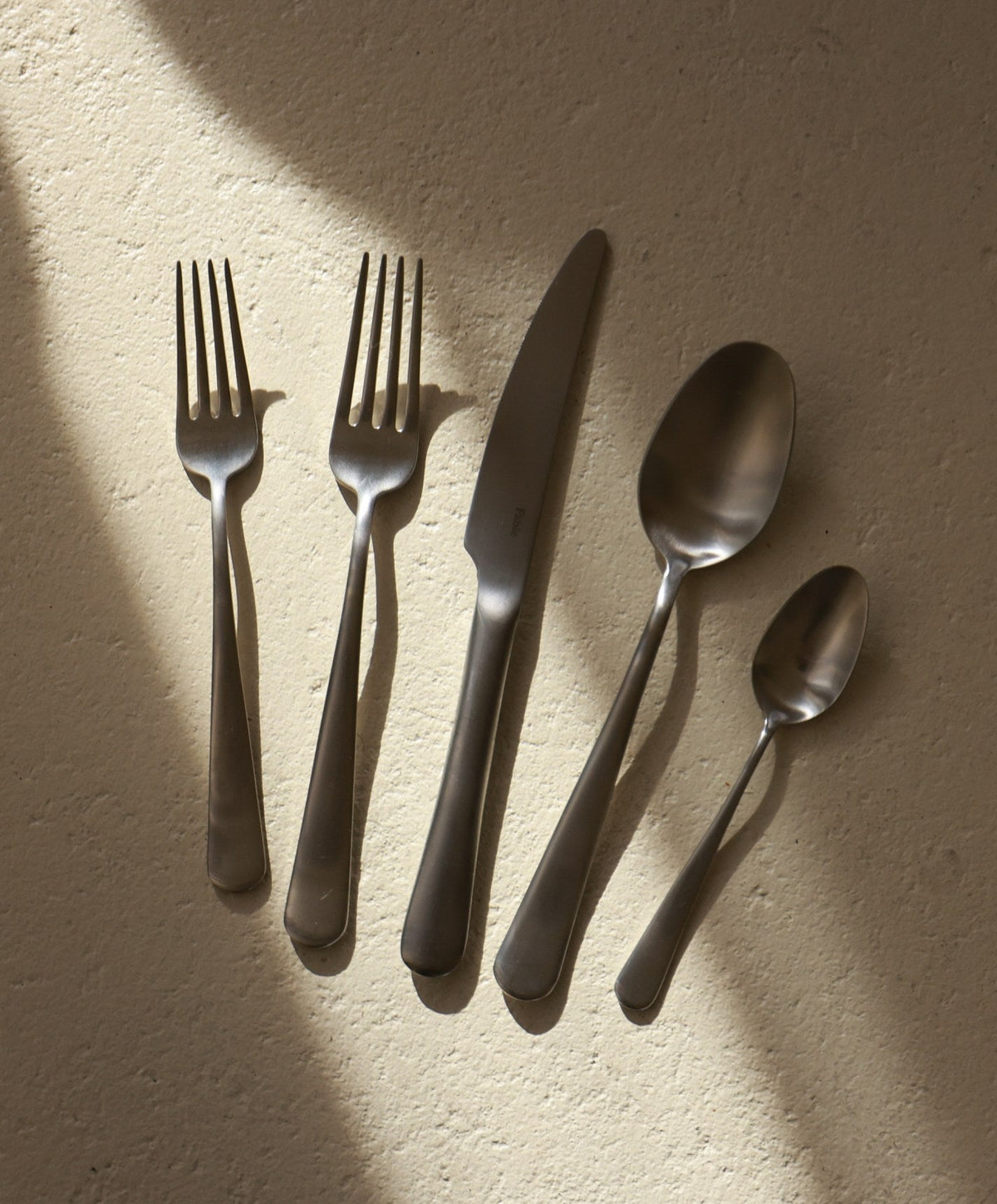 Flatware Set by Fable Home, shown in Matte Silver.