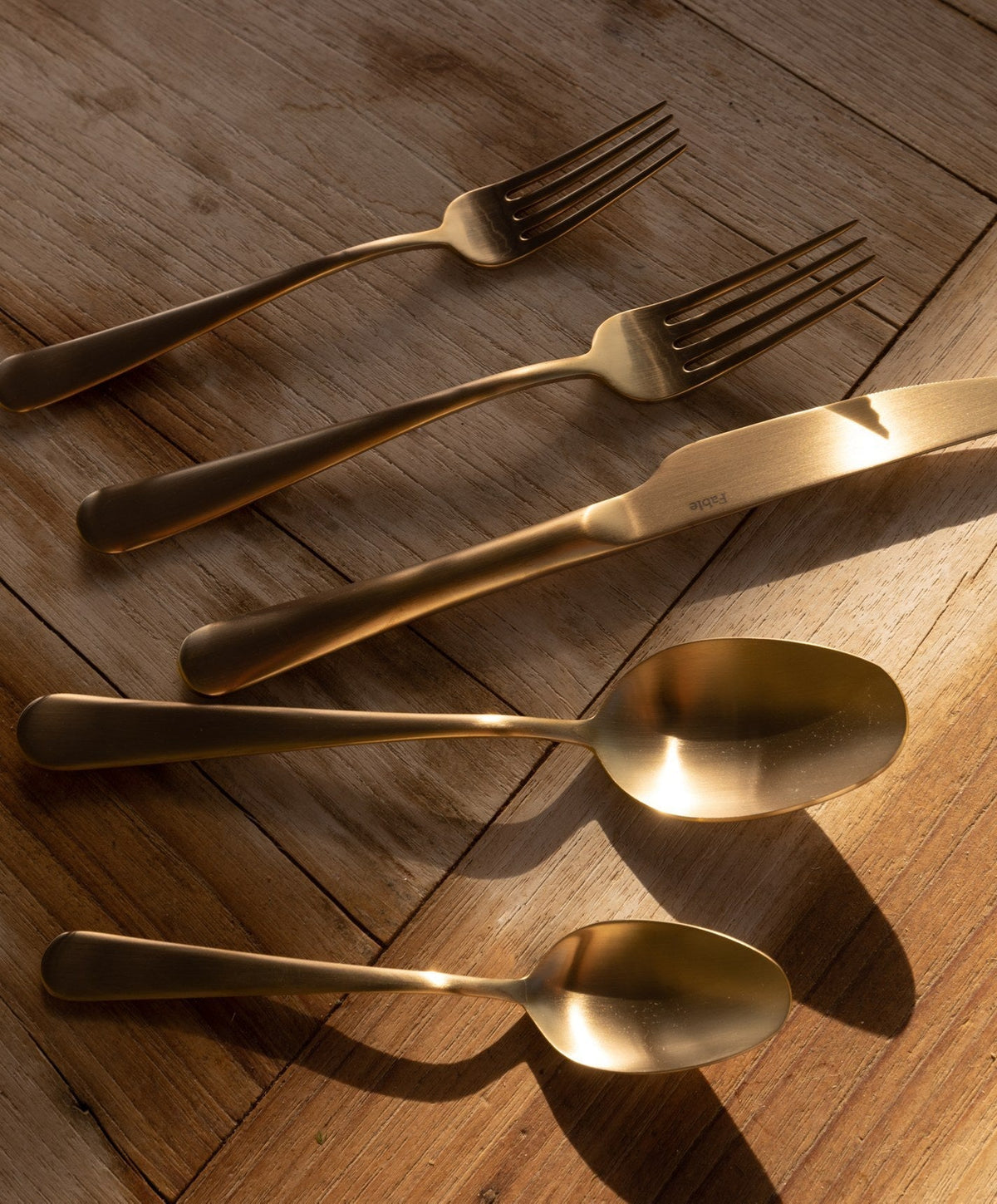 Flatware Set by Fable Home, shown in Matte Gold.