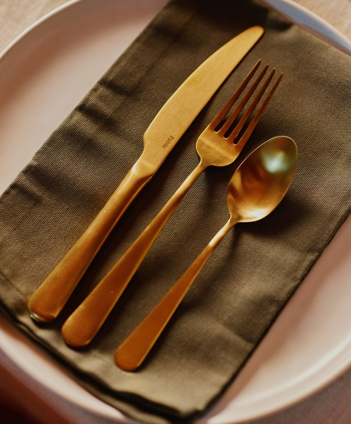 Flatware Set by Fable Home, shown in Matte Gold.