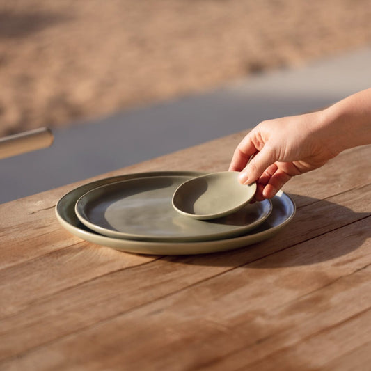 Salad plates dinnerware by Fable Home, shown in a beachgrassgreen finish. – #beachgrassgreen