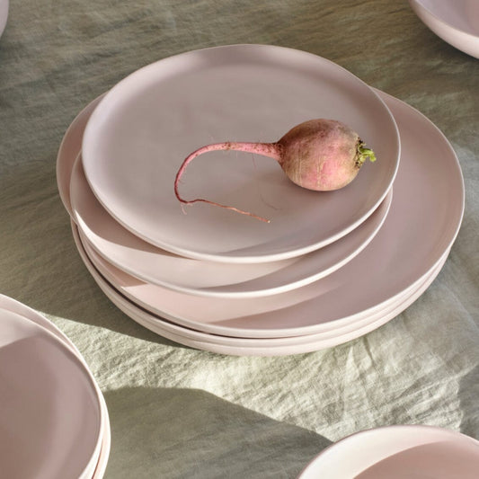 Salad plates dinnerware by Fable Home, shown in a blushpink finish. – #blushpink