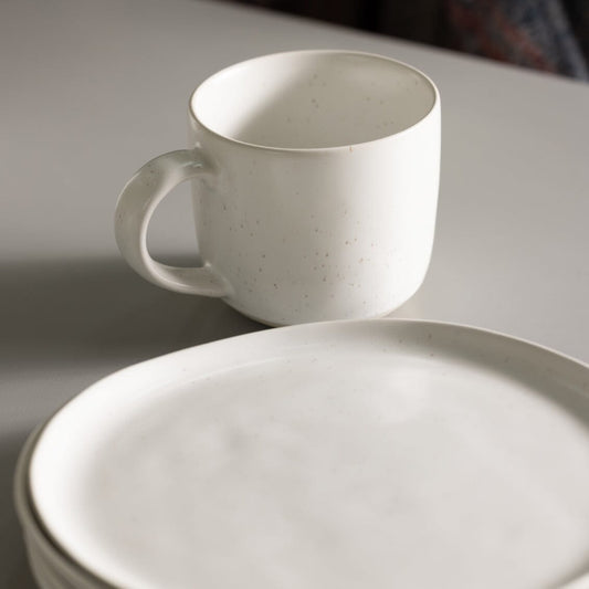 Salad plates dinnerware by Fable Home, shown in a speckledwhite finish. – #speckledwhite