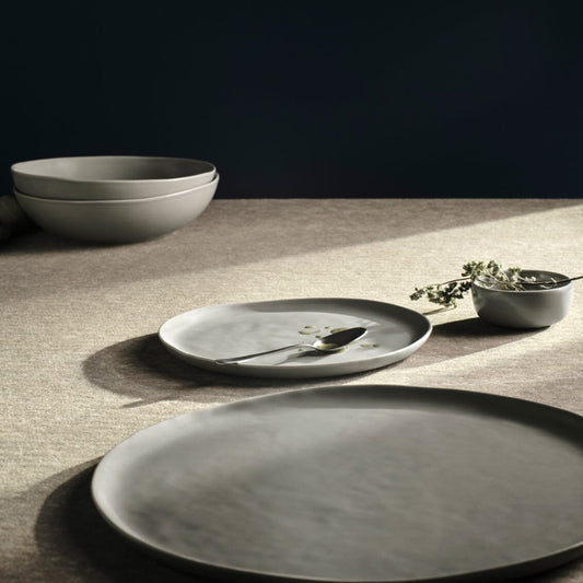 Salad plates dinnerware by Fable Home, shown in a dovegray finish. – #dovegray