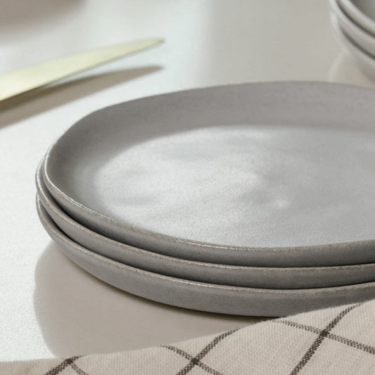 Salad plates dinnerware by Fable Home, shown in a stoneblue finish. – #stoneblue