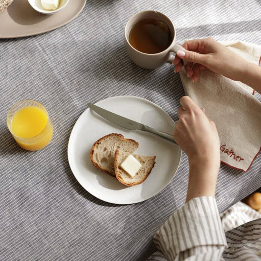 Salad plates dinnerware by Fable Home, shown in a speckledwhite finish. – #speckledwhite