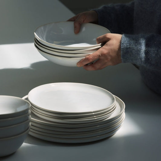 Salad plates dinnerware by Fable Home, shown in a pearlwhite finish. – #pearlwhite