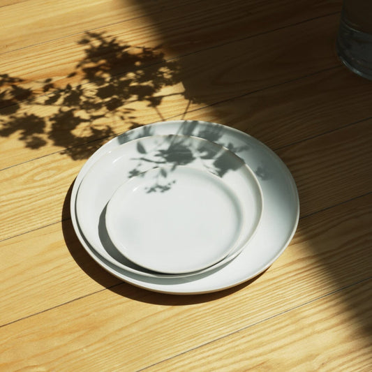 Salad plates dinnerware by Fable Home, shown in a pearlwhite finish. – #pearlwhite