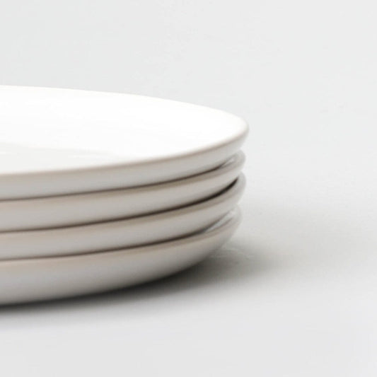 Salad plates dinnerware by Fable Home, shown in a pearlwhite finish. – #pearlwhite