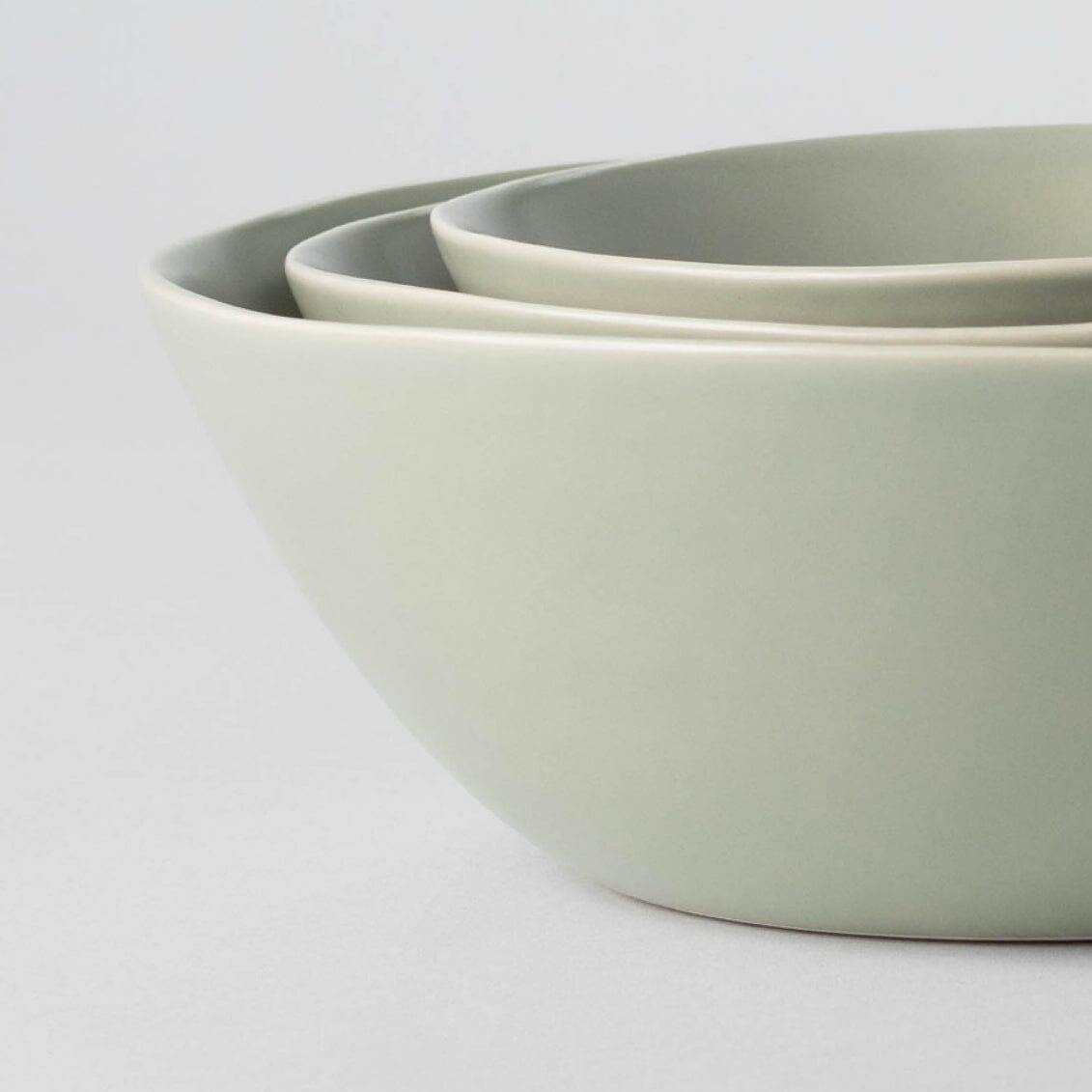 Serving ceramics set bundles by Fable Home, shown in a beachgrassgreen finish.