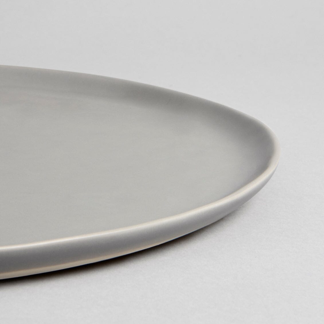 Serving platter dinnerware by Fable Home, shown in a dovegray finish.