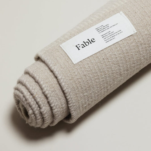 Wool rug rugs by Fable Home, shown in a dune gray. #dunegray